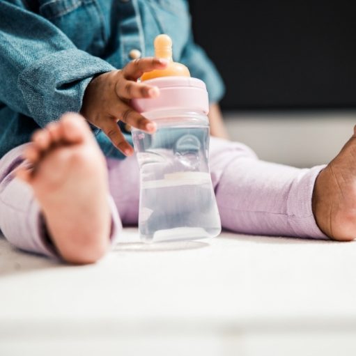 toddler dropping bottles at 12 months