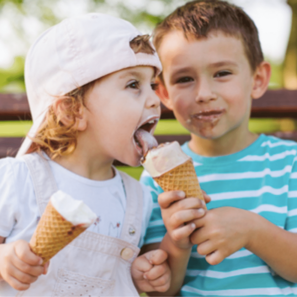 Main image for the article [Top 3 Strategies for Serving Dessert to Kids]. Pictured is a toddler eating an ice cream cone.